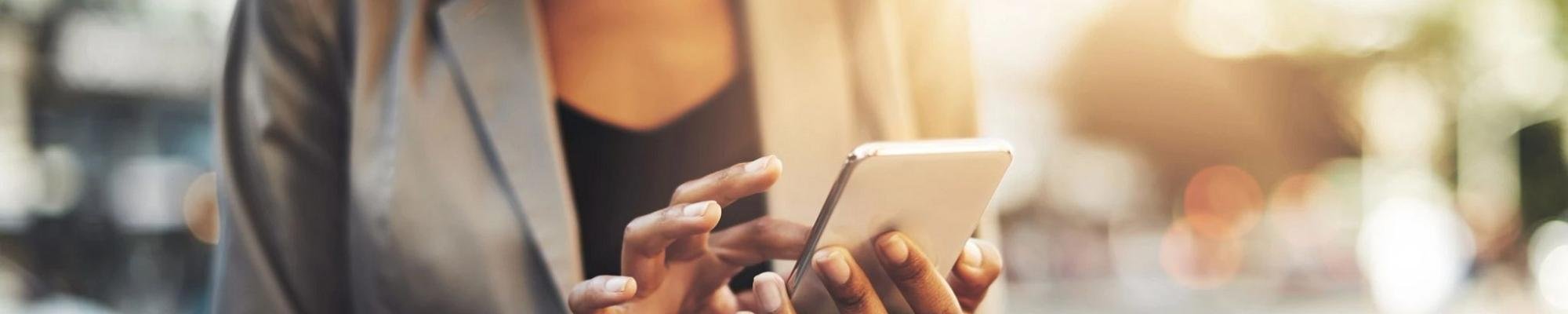 woman using smartphone outside